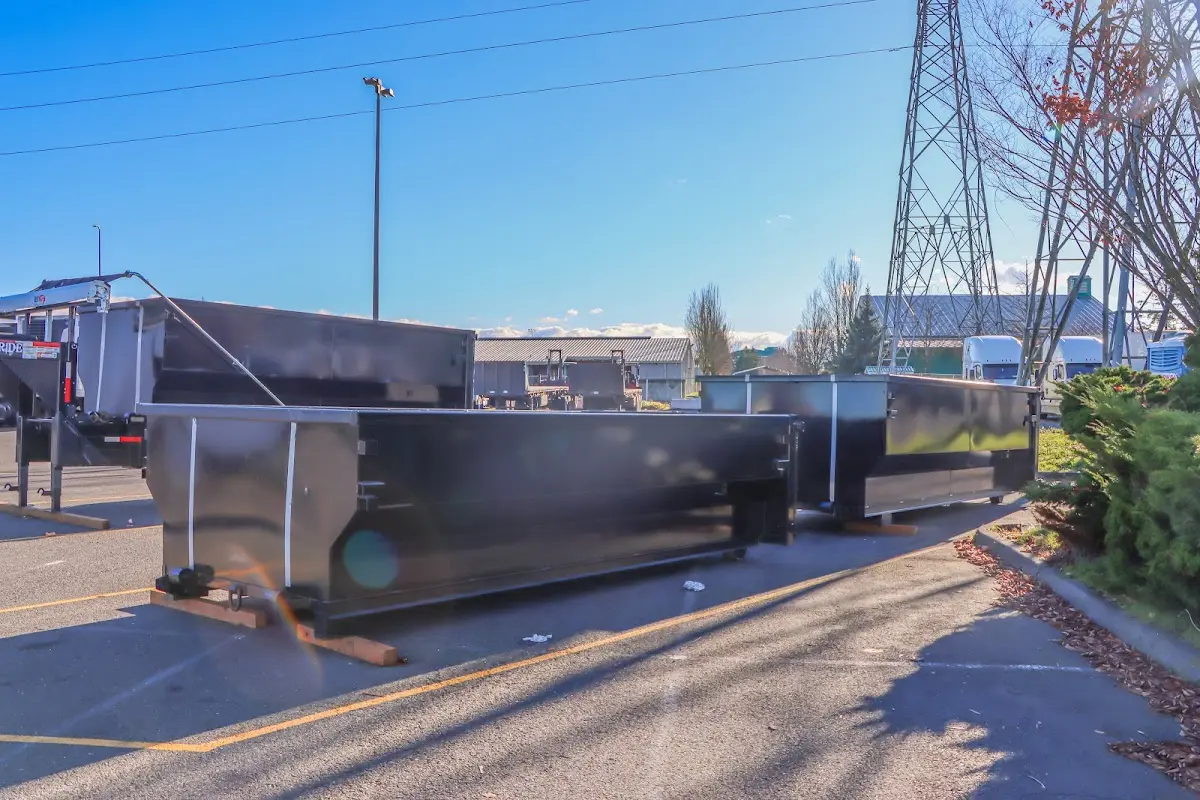 Roll-off dumpster ready for waste disposal at job site for Construction Dumpster Rental in Grinnell